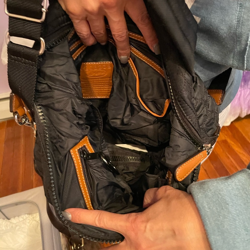 From the Brighton collection, black Crossbody or handbag